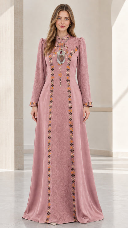 Front full-length view of woman wearing dusty pink embroidered modest maxi dress