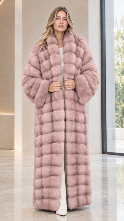 Front full-length view of woman wearing dusty pink paneled faux fur maxi coat