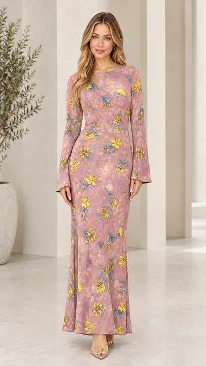 Front view of model wearing Dusty Pink flare sleeve floral maxi dress