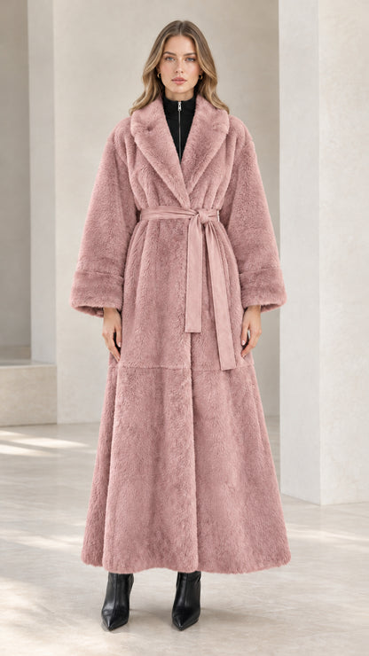 Front full view of dusty pink belted faux fur maxi coat