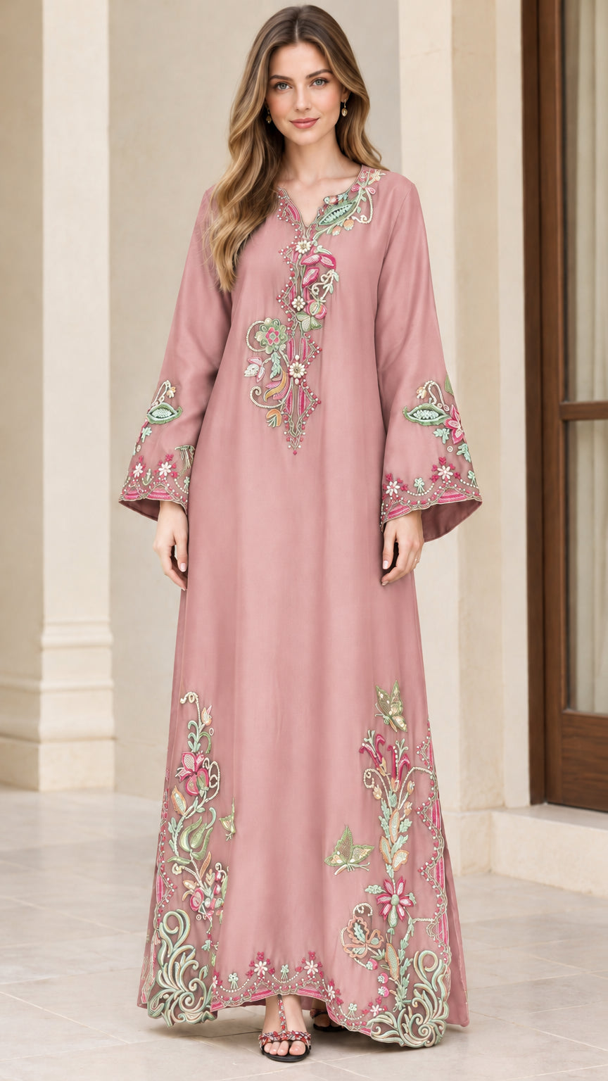 Model wearing dusty pink embroidered V-neck maxi kaftan dress