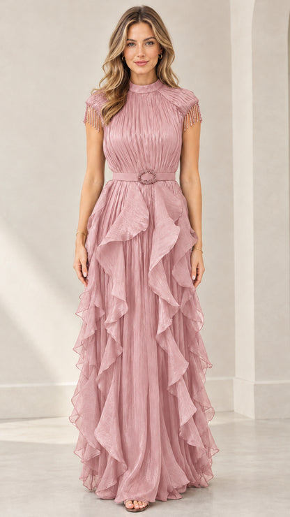 Front view of woman wearing dusty rose pink pleated tiered ruffle evening maxi gown