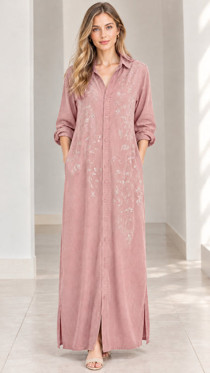 Front view of woman wearing dusty rose pink embroidered maxi shirt dress