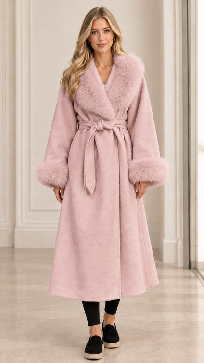 Front view of women's pastel pink belted long wrap coat with matching faux fur details