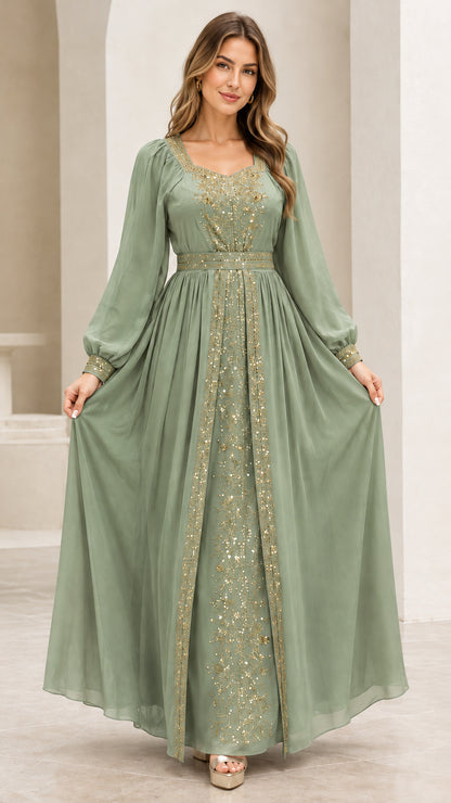 Front view of Sage Green pleated long sleeve maxi evening gown with gold accents