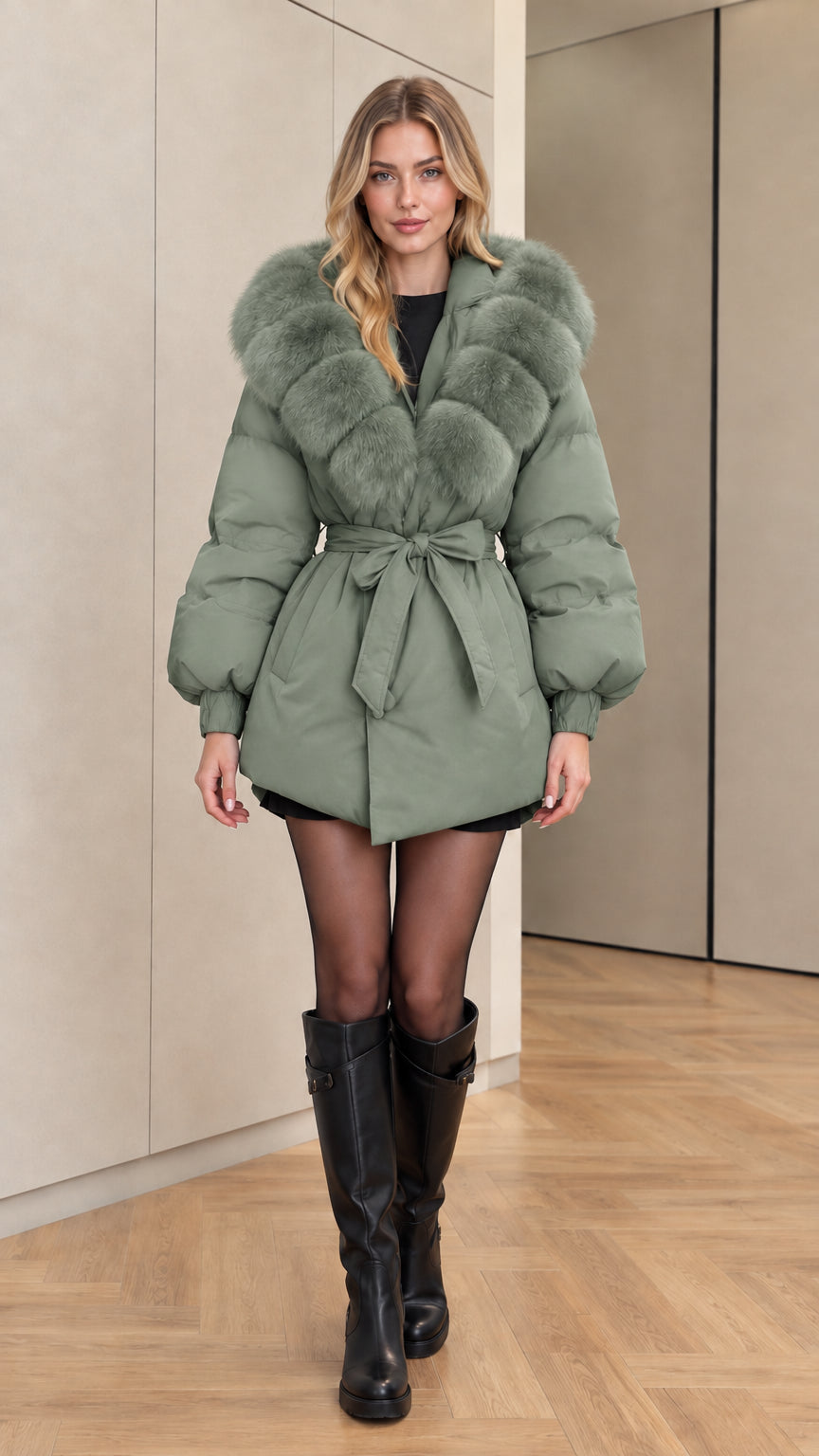 Front view of model wearing sage green hooded belted puffer jacket