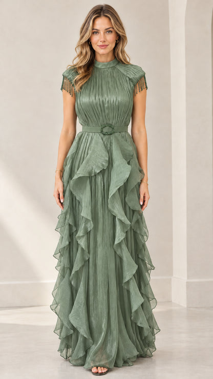 Front view of woman wearing sage green pleated tiered ruffle formal evening gown