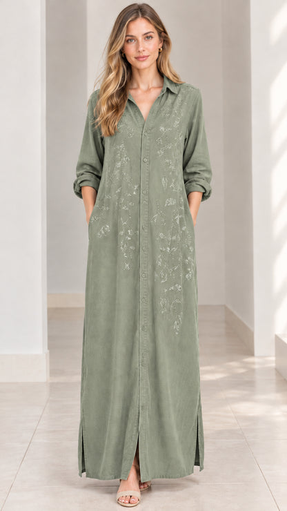 Front view of woman wearing sage green embroidered maxi shirt dress