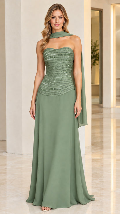 Model wearing sage green strapless embellished floor-length evening gown with drape scarf