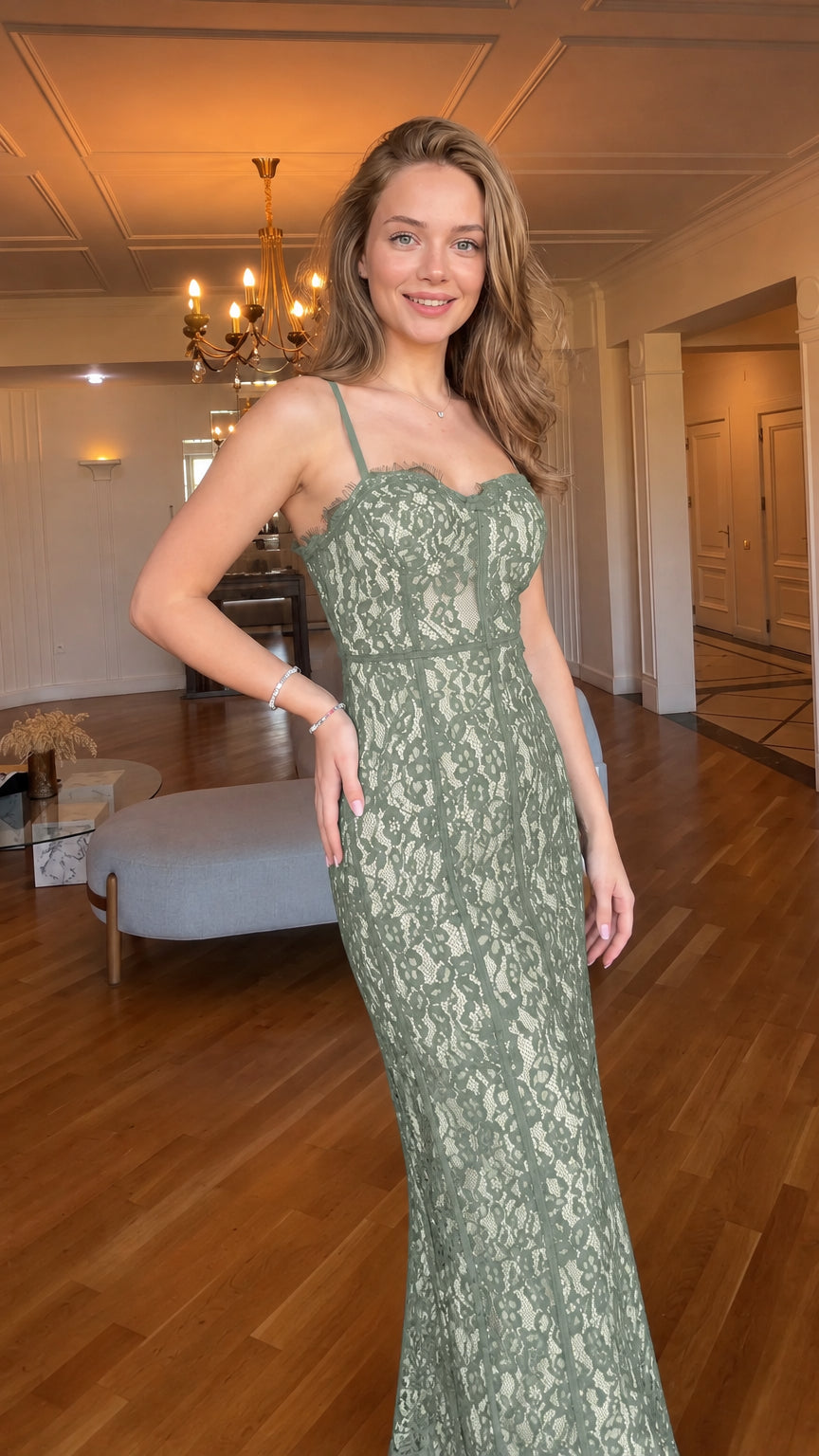 Woman wearing sage green floral lace corset maxi evening dress