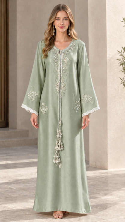 Full-length view of sage green embroidered kaftan maxi dress