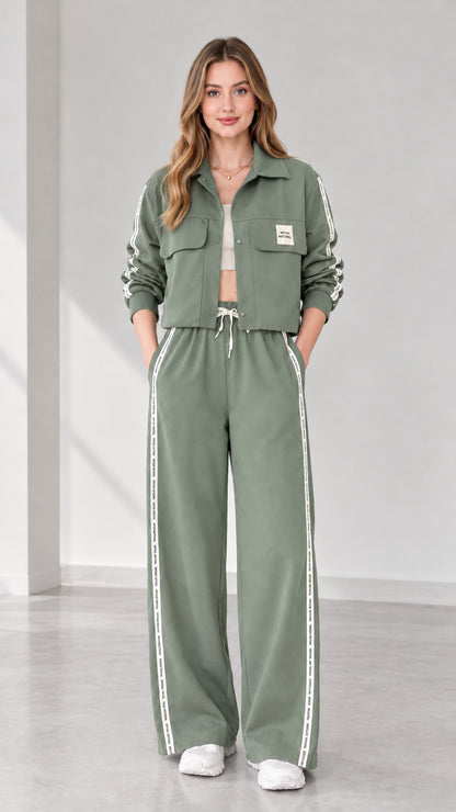 Full view of women's cropped jacket and wide-leg track pants set in sage green