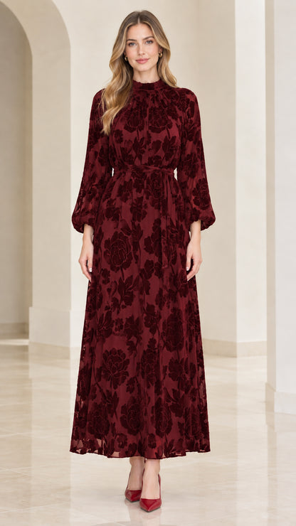 Front view of model wearing burgundy floral velvet burnout maxi dress