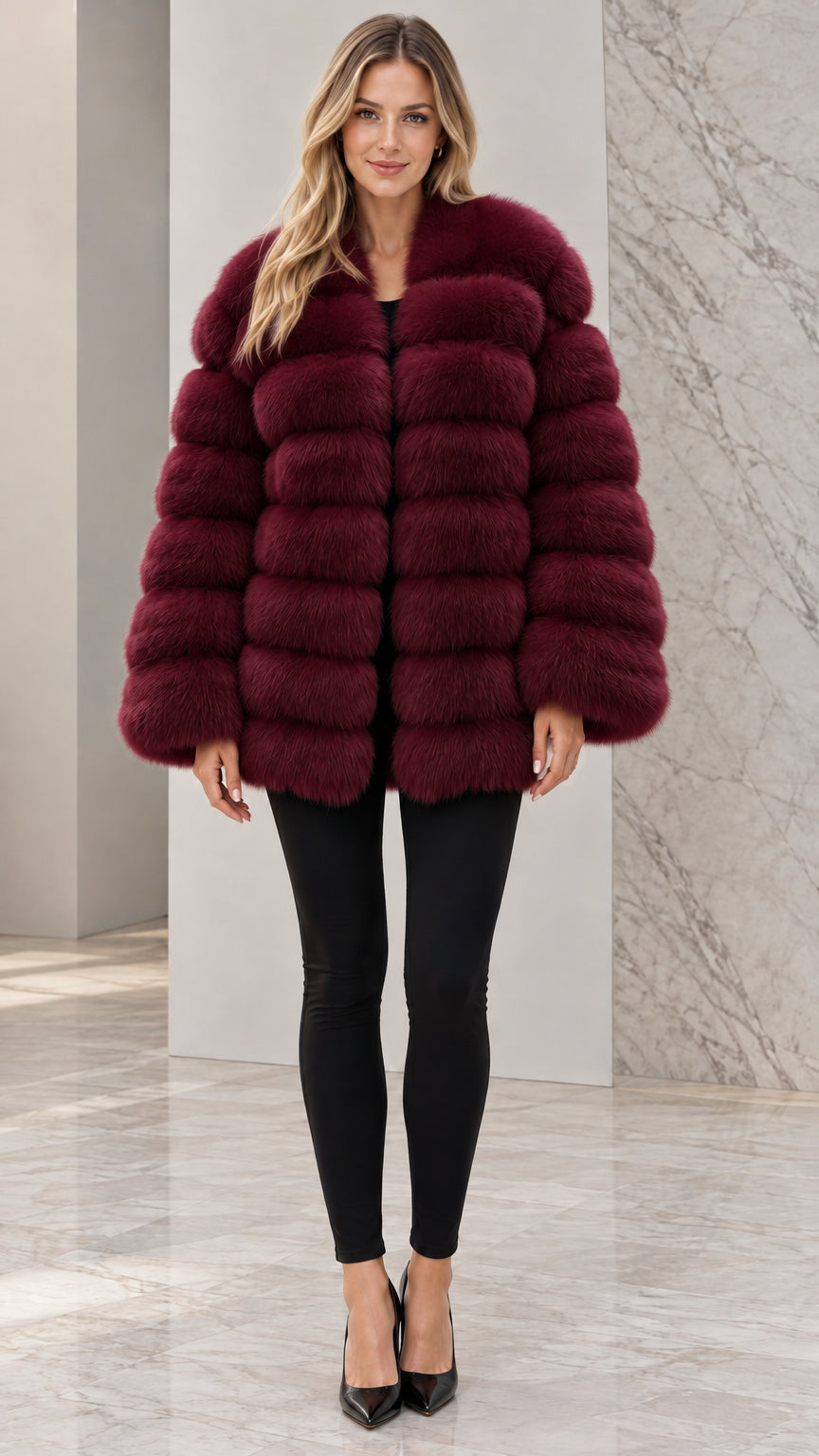 Front view of model wearing burgundy wine red plush faux fur coat