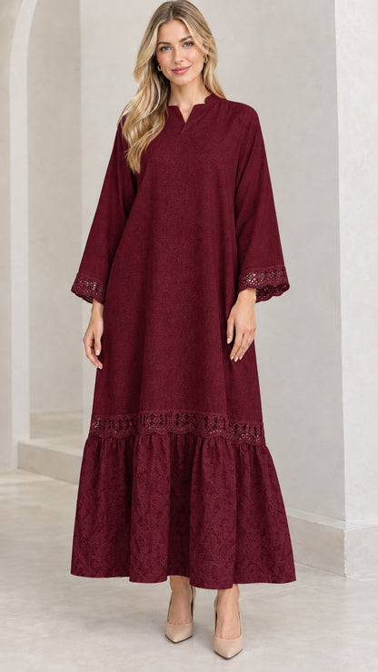 Front view of woman wearing burgundy wine lace-trimmed tiered maxi dress