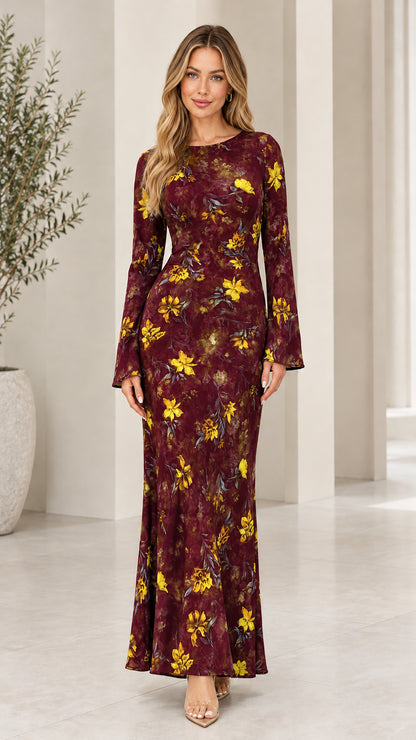 Front view of model wearing Burgundy flare sleeve floral maxi dress