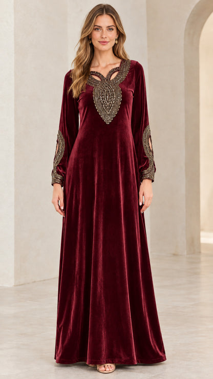 Model wearing Burgundy red velvet embellished formal maxi gown