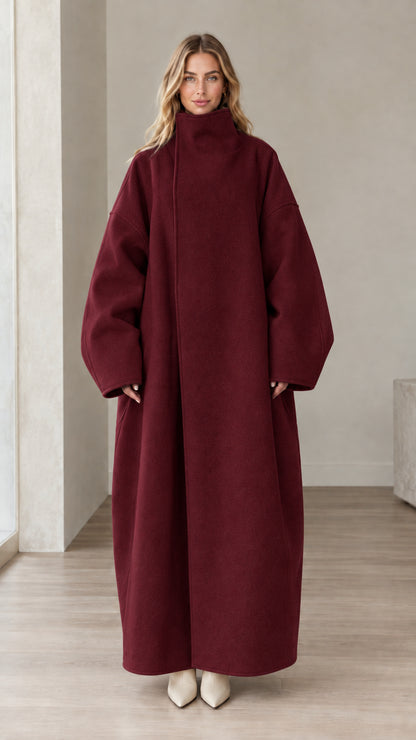 Front full view of woman wearing Burgundy high neck oversized maxi coat