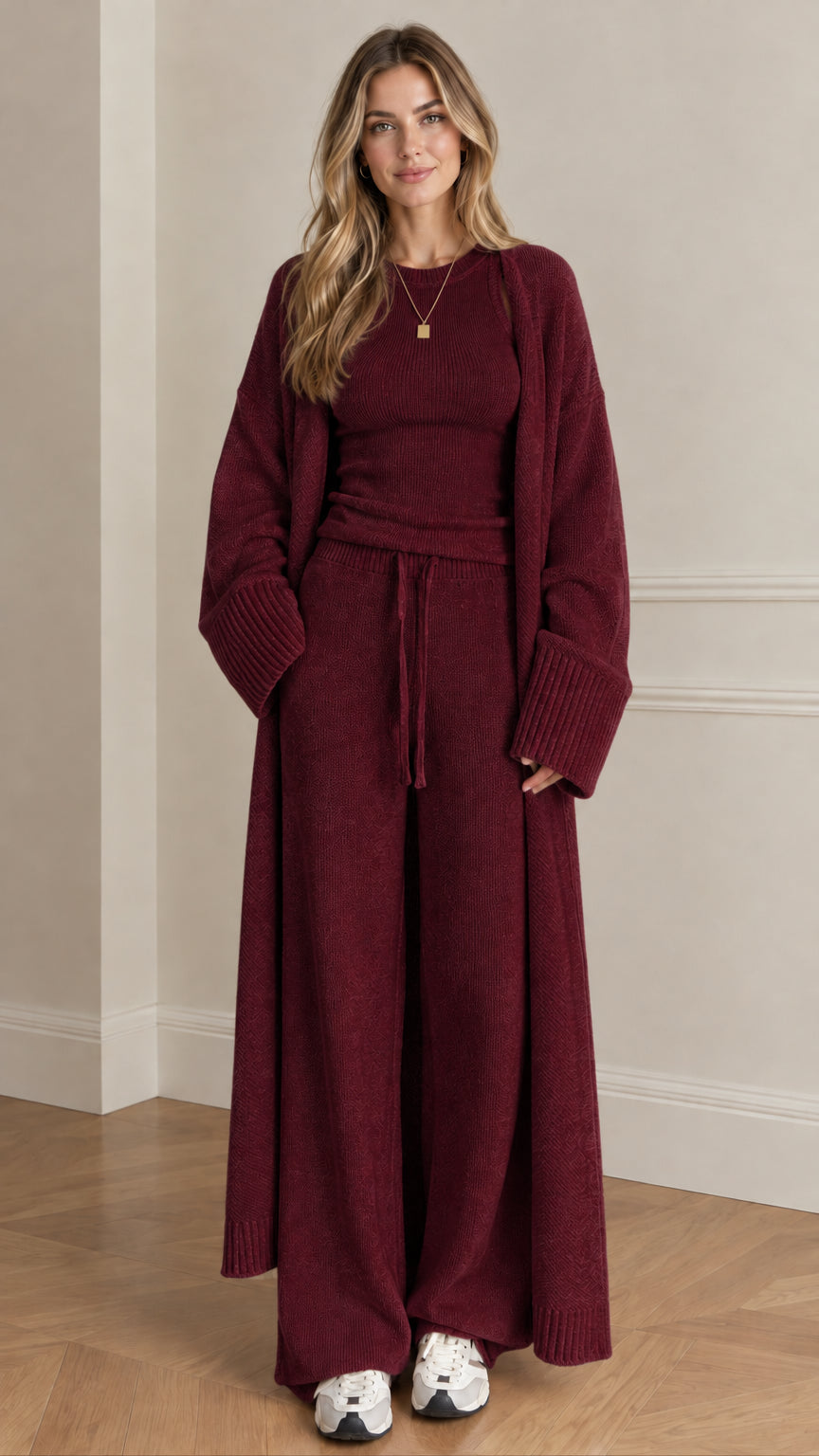Front view of woman wearing burgundy wine 3-piece knit lounge set with maxi cardigan