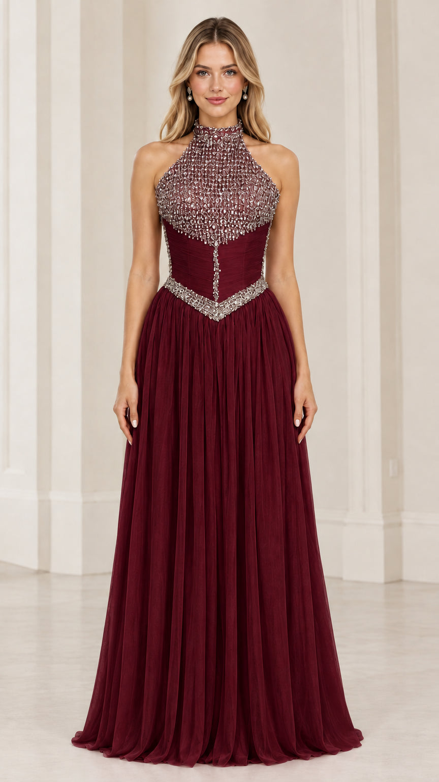 Front view of burgundy rhinestone embellished halter neck formal evening gown