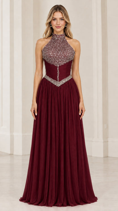 Front view of burgundy rhinestone embellished halter neck formal evening gown