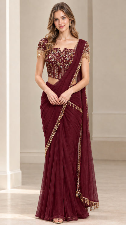 Full front view of burgundy pre-draped saree set with sequin corset