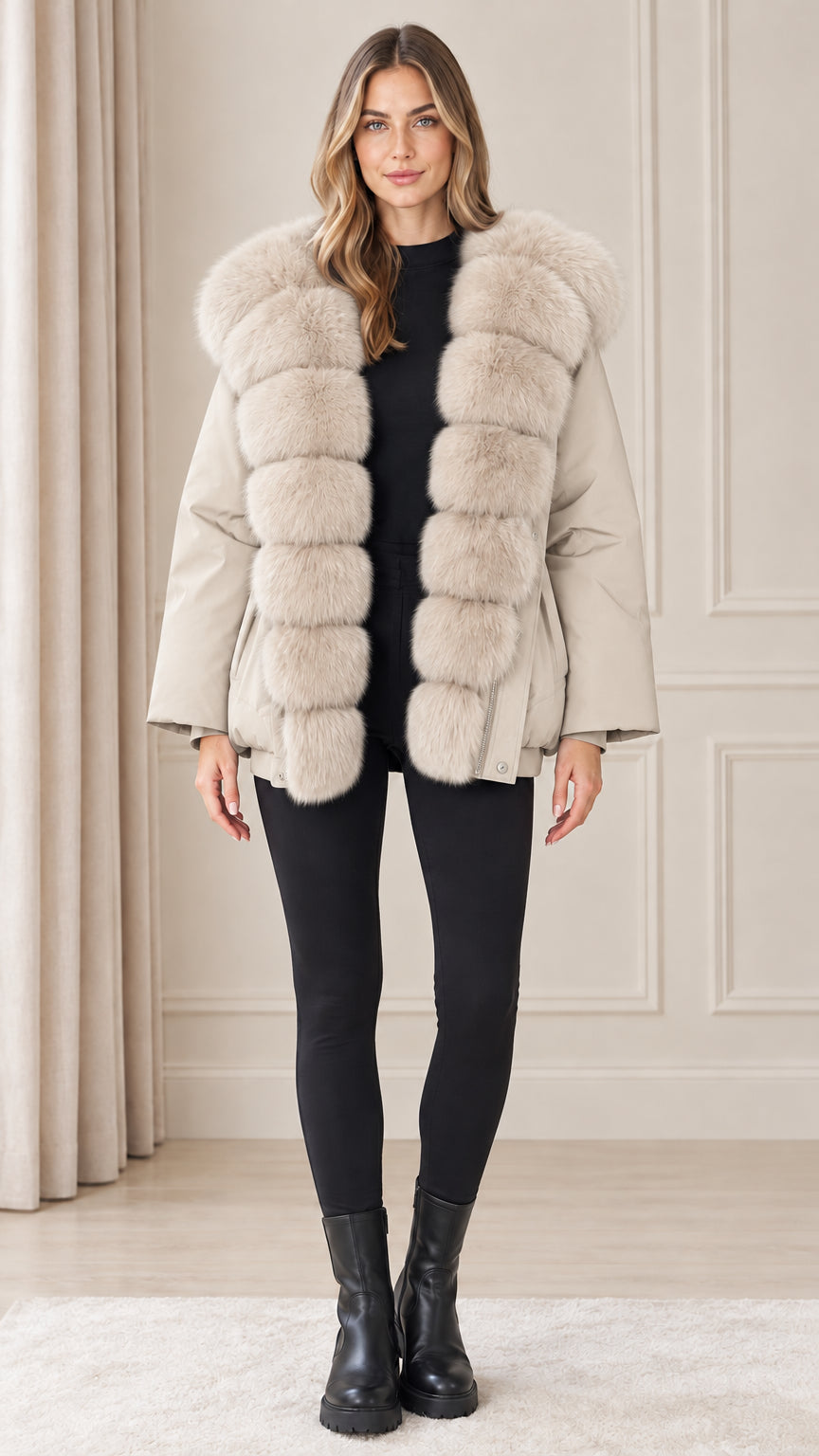 Front view of model wearing cream light beige plush trim hooded winter coat