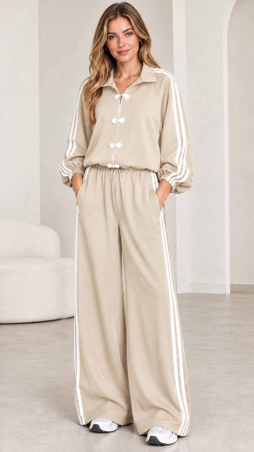 Model wearing beige neutral frog button wide-leg tracksuit set