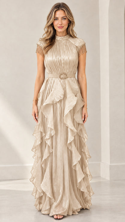 Front view of woman wearing champagne gold pleated tiered ruffle evening gown