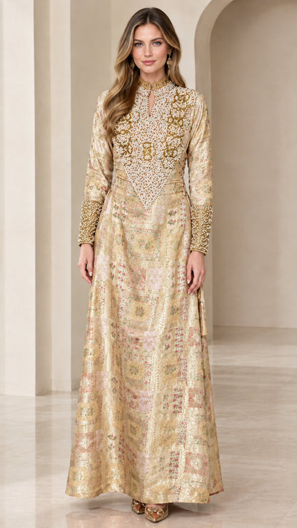 Champagne gold pearl-embellished long sleeve formal gown