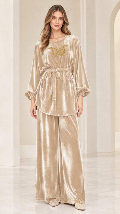 Front view of champagne beige velvet embellished matching two piece pants set