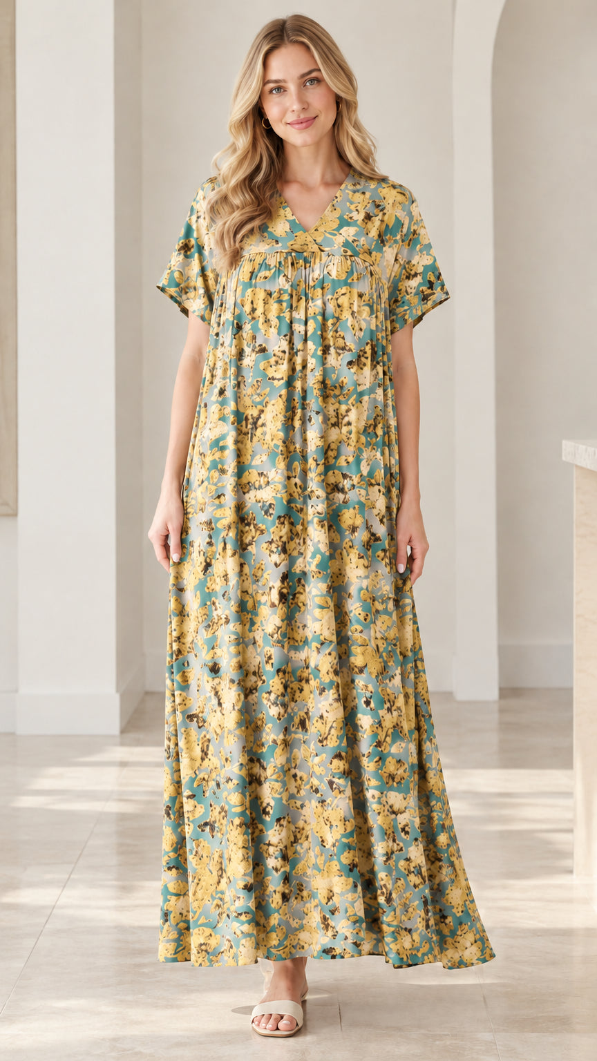 Model wearing dusty blue and yellow floral V-neck short sleeve maxi dress