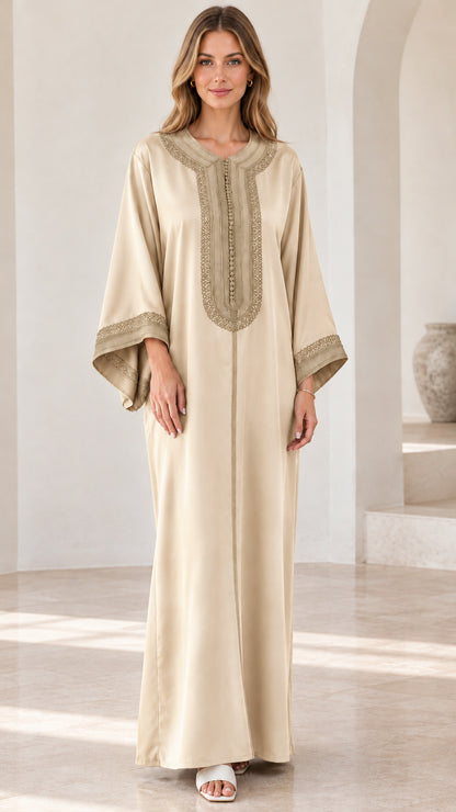 Full-length view of woman wearing beige champagne embroidered kaftan maxi dress